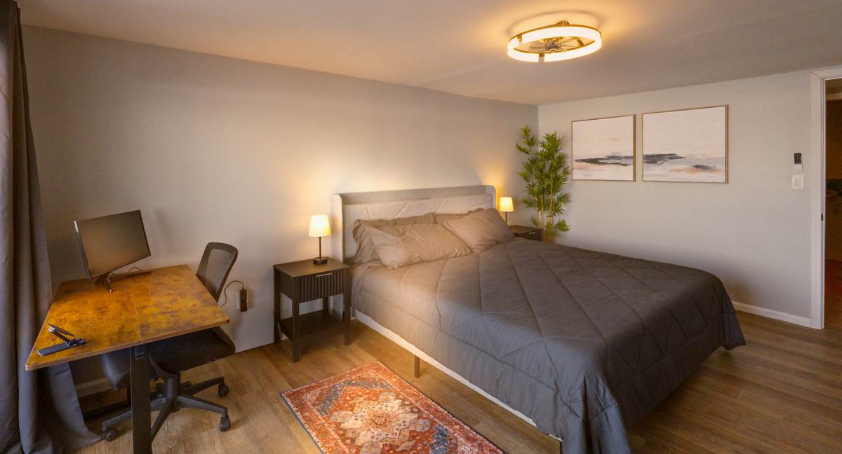 Master king bedroom with desk nook, golden hour