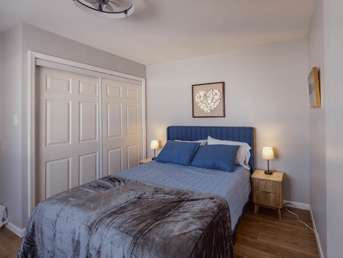 Queen bedroom at golden hour