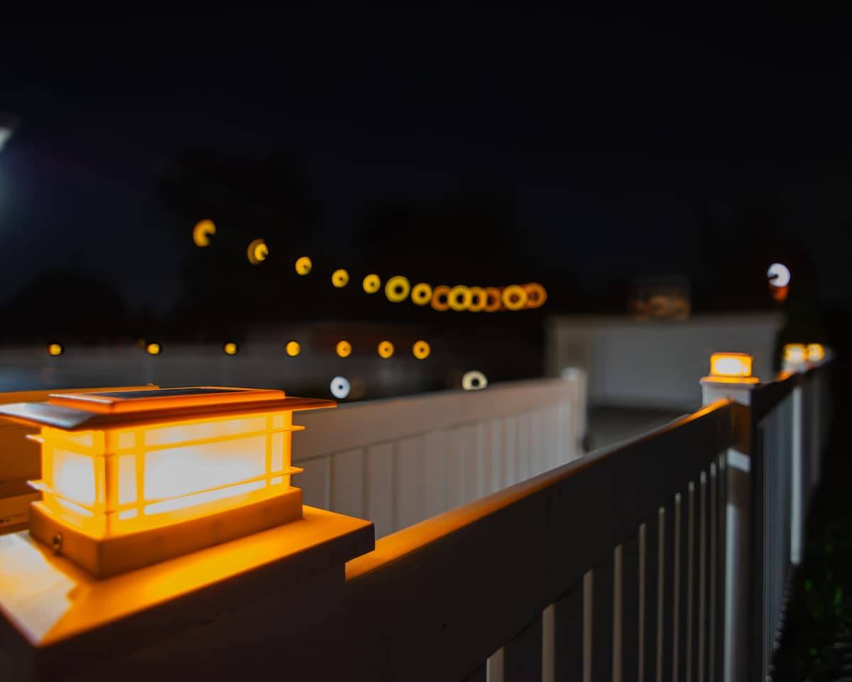 String lights over the driveway at night