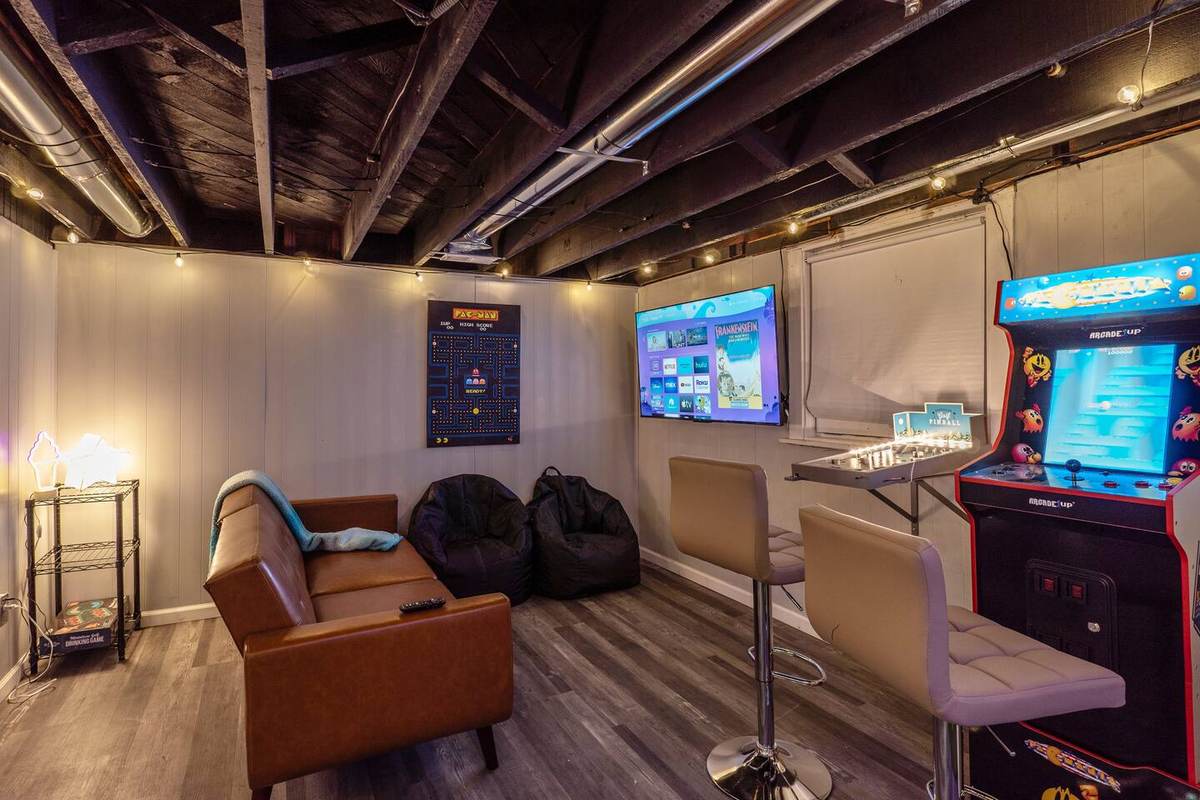 Basement arcade nook with the Pac-Man, Dig Dug and Galaga cabinet