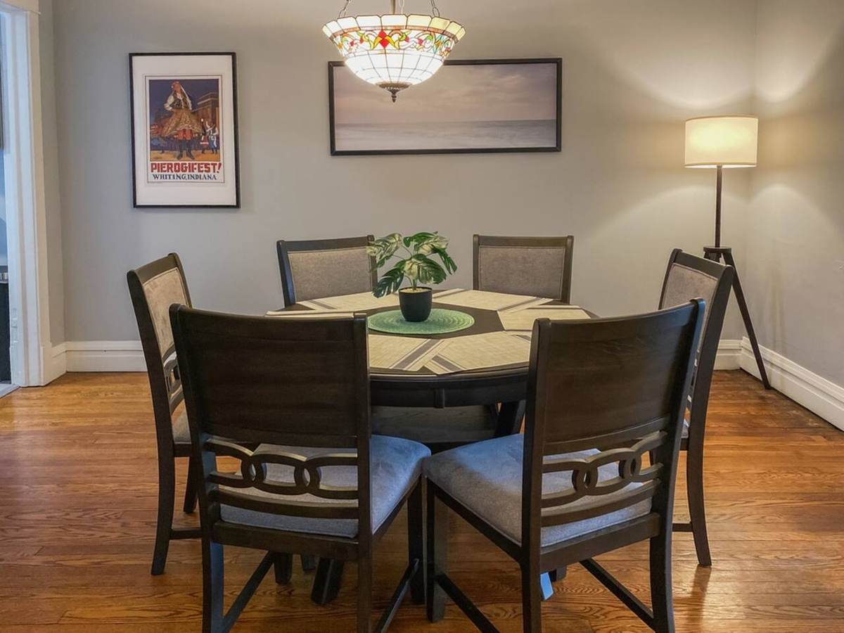 Round dining table under the chandelier