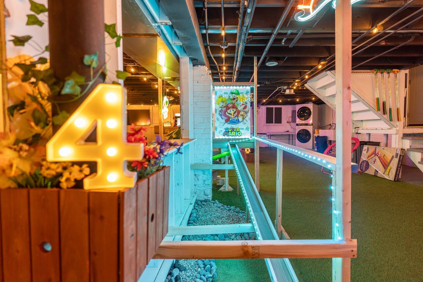 The neon number-four hole on the basement course