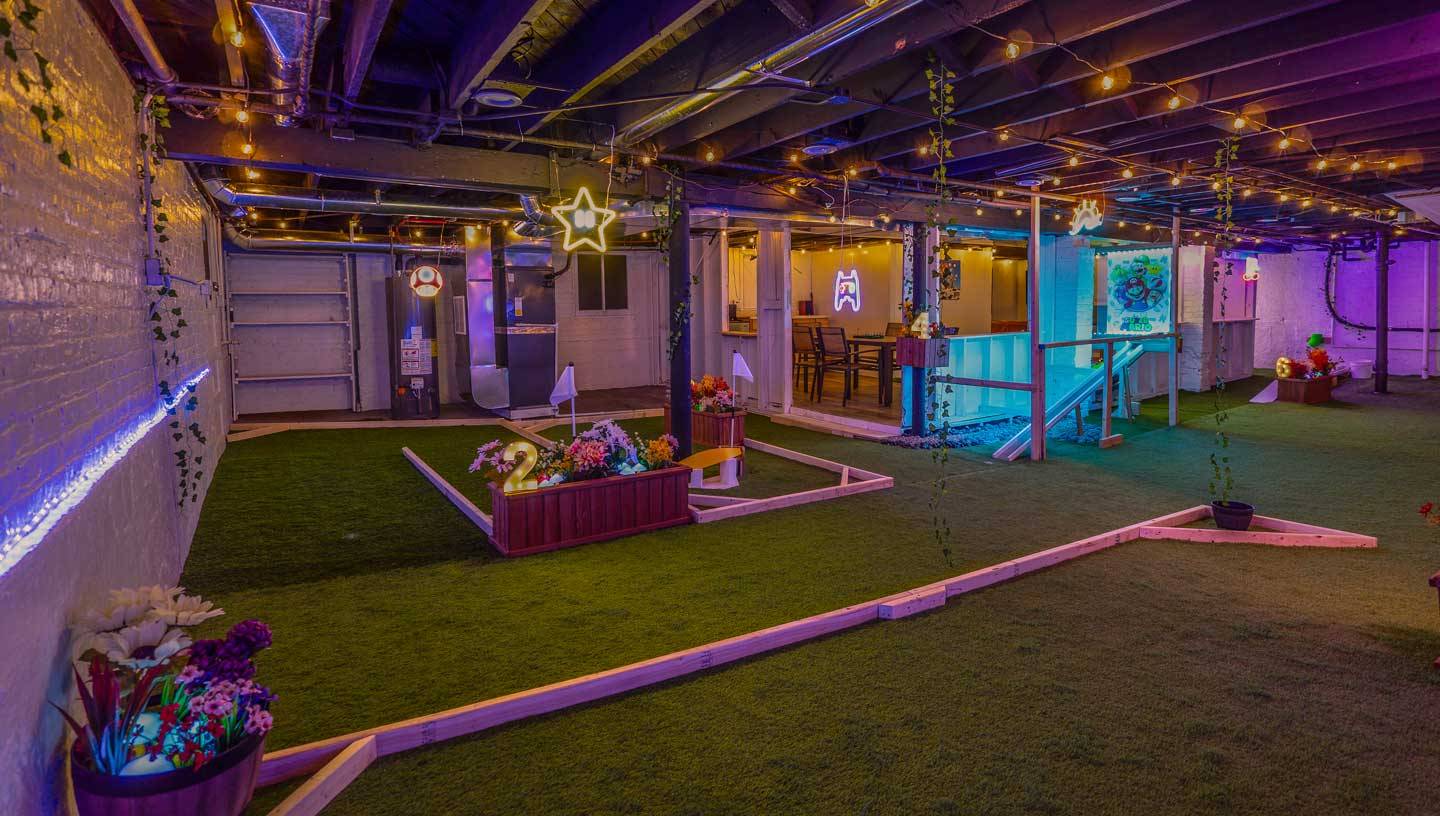 Hole 1 of the six-hole basement mini golf course at MiniGolfHouse Whiting